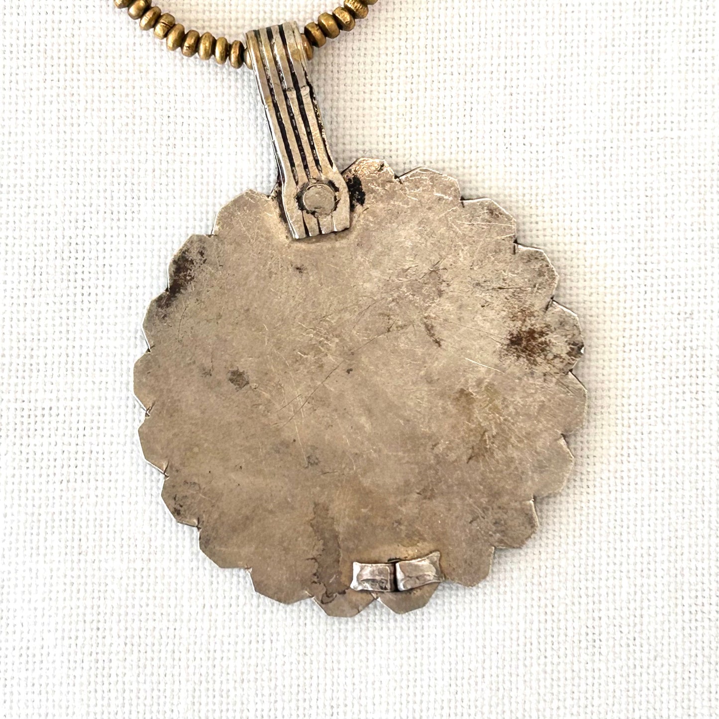 Brass necklace with large antique Moroccan silver flower pendant