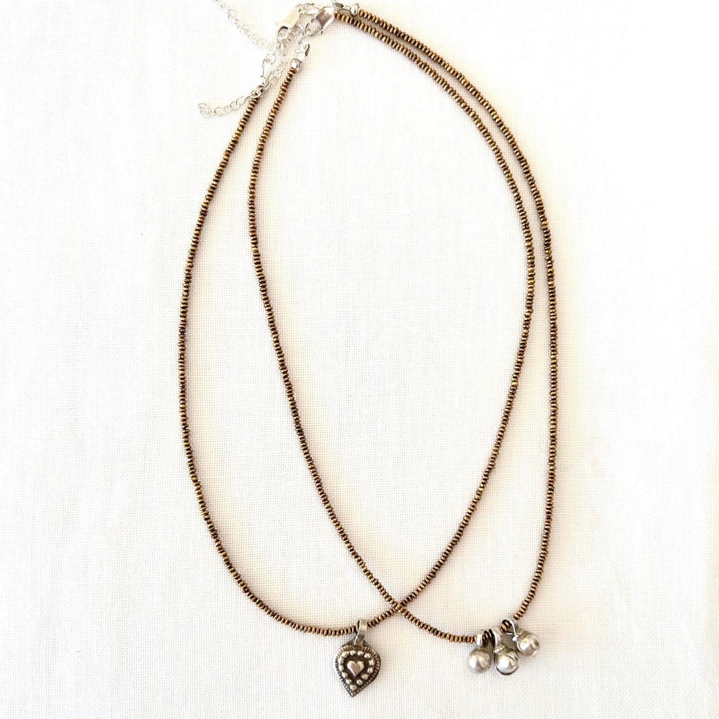 Brass necklace with silver heart